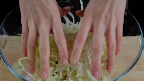 Hands Shredding Cabbage in Bowl Cooking Stock-Footage 341434017