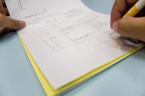 Hands signing a contract Stock Photos