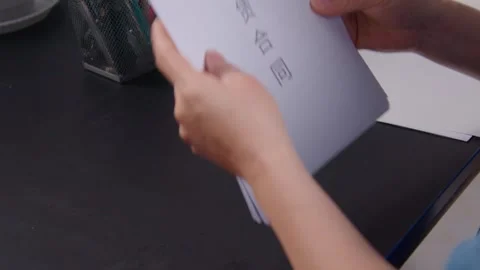 Hands Signing Rental Contract Documents on Dark Office Desk Video stock 336545445