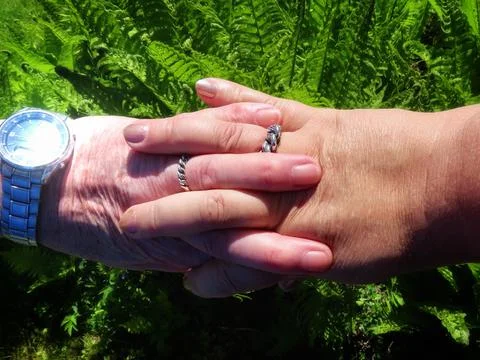 Hands with silver rings Foto stock