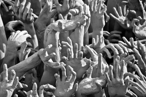 Hands of sin men in hell Stock Photos