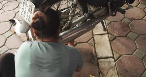 Hands skillfully cut salmon fillet into precise pieces, showcasing technique and Stock Footage 302123506