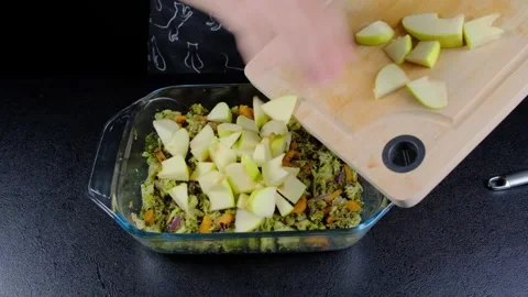 Hands Slicing Apples and Mixing Ingredients Cooking Video stock 341432592