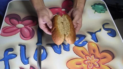 Hands Slicing Brown Bread With Knife Close Up Stock Footage 343889779
