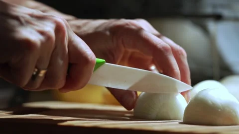 Hands Slicing Fresh Onion Slow Motion. Video stock 342319544