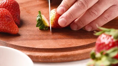 Hands Slicing Strawberries Closeup. Stock Footage 72545855