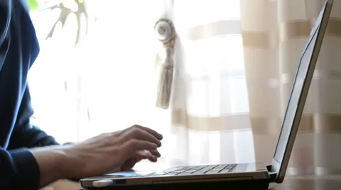 Hands of slim young man starting to touch type on laptop at home Stock Footage 50352081