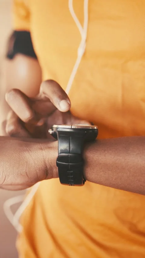 Hands, smart watch and click for fitness in city with timer, route or digital Stock Footage 329666630