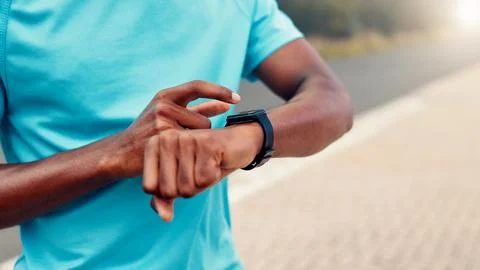 Hands, smart watch and timer for runner in summer, click and check map for Stock Photos