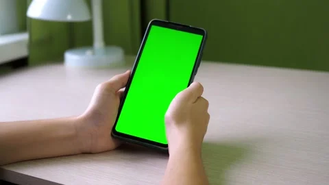 Hands with a smartphone close-up. flipping through the tape. a teenager is Stock Footage 169466592