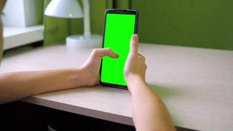 Hands with a smartphone close-up. flips his finger across the screen. a teenager Stock Footage 167156819