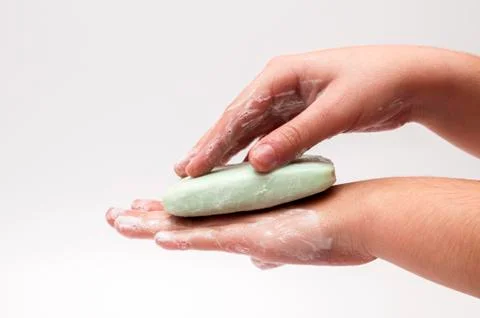 Hands with soap Stock Photos