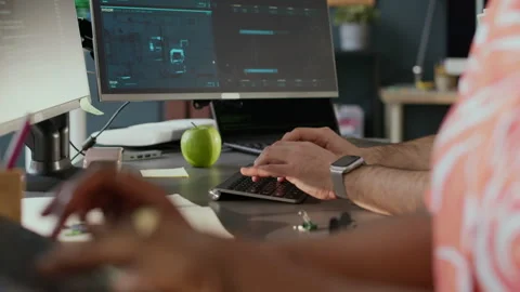 Hands of Software Engineers Coding on Computers at Office Desk Stock Footage 306843387