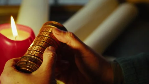 Hands Solving Cryptex in Candlelight, Code Breaking and Secret Discovery Stock Footage 334084261