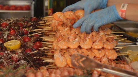 Hands sorting caridea on stick. Stock Footage 79284902