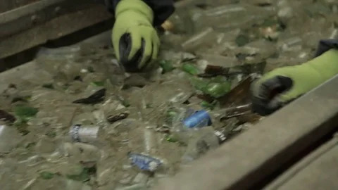 Hands sorting glass waste Stock Footage 72857115