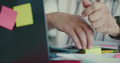 Hands Sorting Papers in Office Workspace Stock Footage 323586994