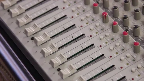 Hands of sound engineer working on recording studio mixer Stock Footage 73607168