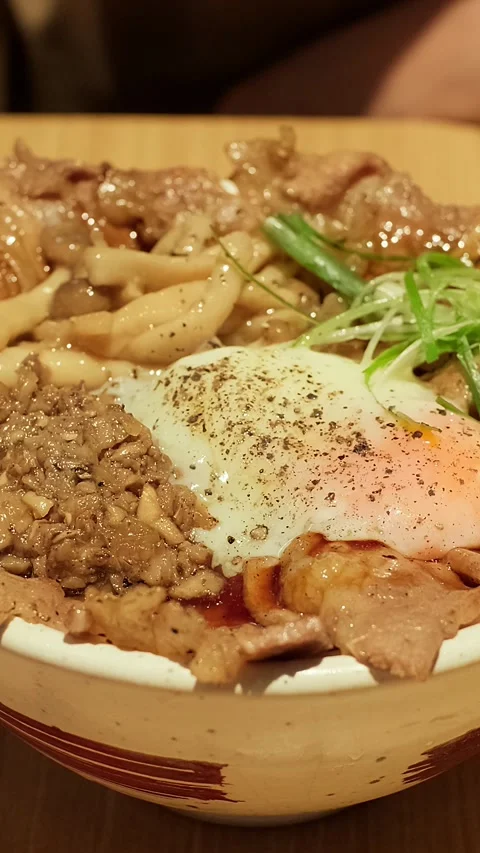 Hands split crispy fried chicken karage Stock Footage 338347986