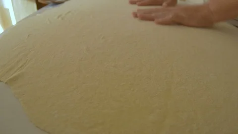 Hands Spread Pizza Dough Stock Footage 119369557