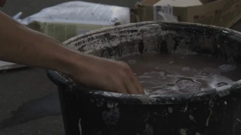 Hands squeeze a rag Stock Footage 112108733