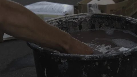 Hands squeeze a rag Stock Footage 112109121