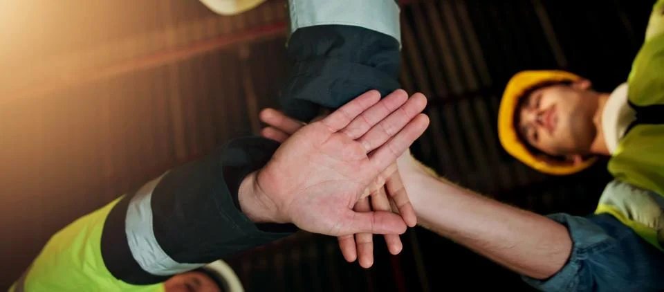 Hands stack, team and engineer with people in warehouse for solidarity Stock Photos