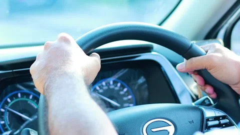 Hands Steering a Car in Daylight Drive Stock Footage 305302267