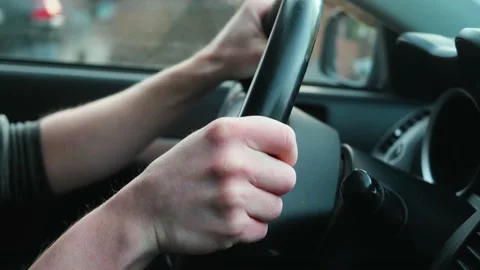 Hands on the steering wheel close-up. Stock Footage 154657084