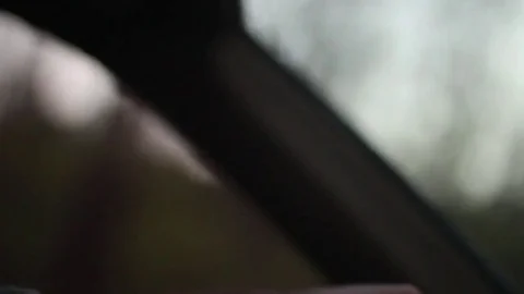 Hands on a Steering Wheel at Dusk Stock Footage 75035301