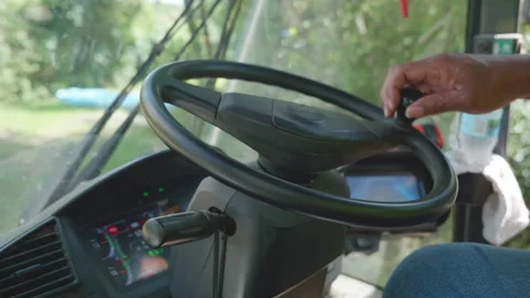 Hands on steering wheel of heavy construction vehicle Stock Footage 249762671