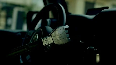 Hands on steering wheel. Man with Robot arm on a steering wheel while driving. Stock-Footage 336266116