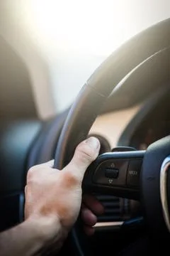 Hands on steering wheel Stock-Fotos