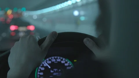 Hands on the steering wheel in the tunnel Stock Footage 103521926
