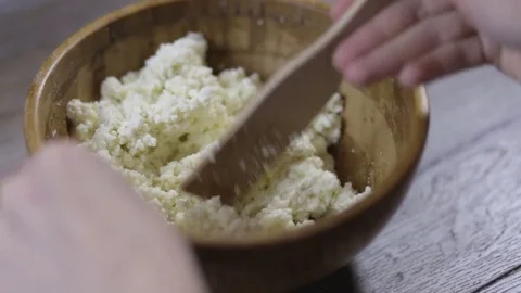 Hands stirred curd close-up Stock Footage 72995078