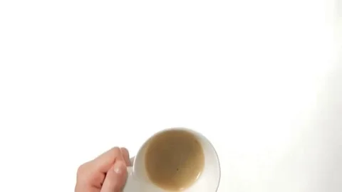 Hands Stirring Coffee on white background Stock Footage 98247654