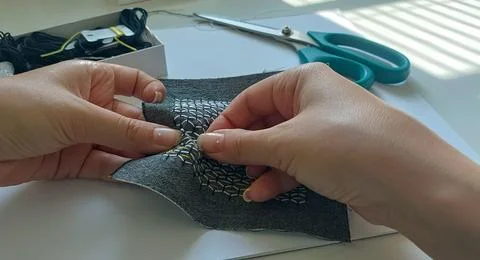 Hands stitching sashiko embroidery pattern Stock Photos