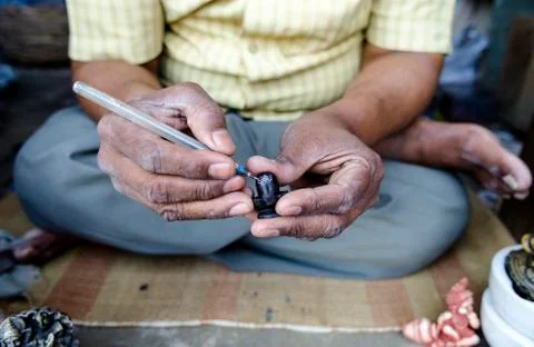 Hands Of Stonecutter Stock Photos