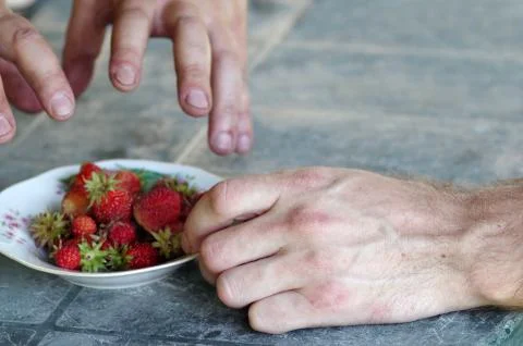 Hands On Strawberries Photos