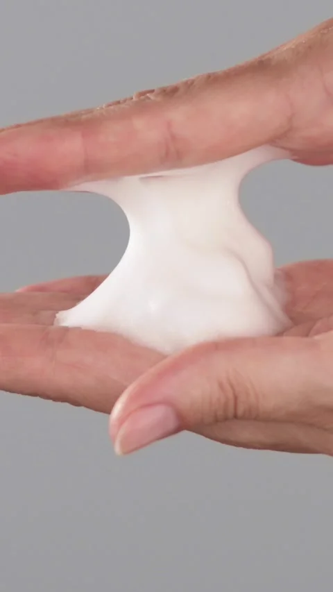 Hands Stretching Cleansing Foam Texture Stock Footage 319137725