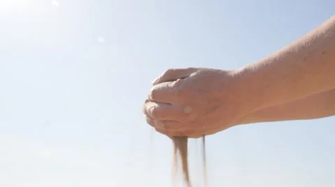 Hands strew sand Stock Footage 61285144