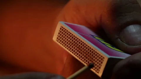 Hands Striking a Match Stock Footage 74513444