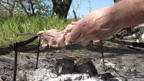 Hands string pieces of raw meat on a skewer in 4K Stock Footage 153613643