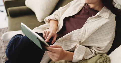 Hands, student and reading with tablet at house for research, education and Stock Footage 327455354