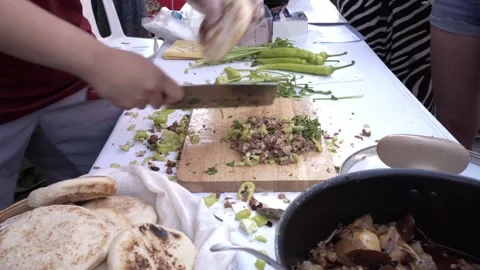 Hands Stuffing Baijimo Bread With Roujiamo Pork Filling Stock Footage 338164325