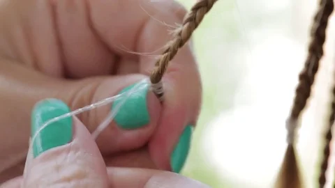 Hands stylist braid dreadlocks girl teen Stock Footage 76041508