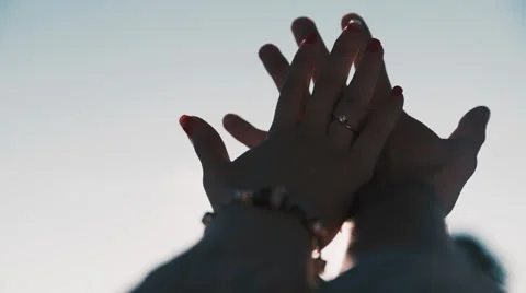 Hands of the sun HD Stock Footage 62239524