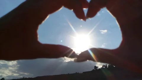 Hands sun sky Stock Footage 84049915