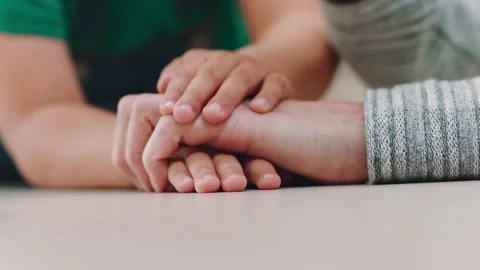 Hands, support and trust with mother and child, comfort and love with commitment Stockbeeldmateriaal 226276085