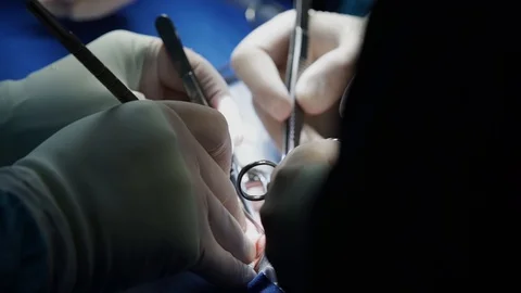 The hands of a surgeon Stock Footage 127702004